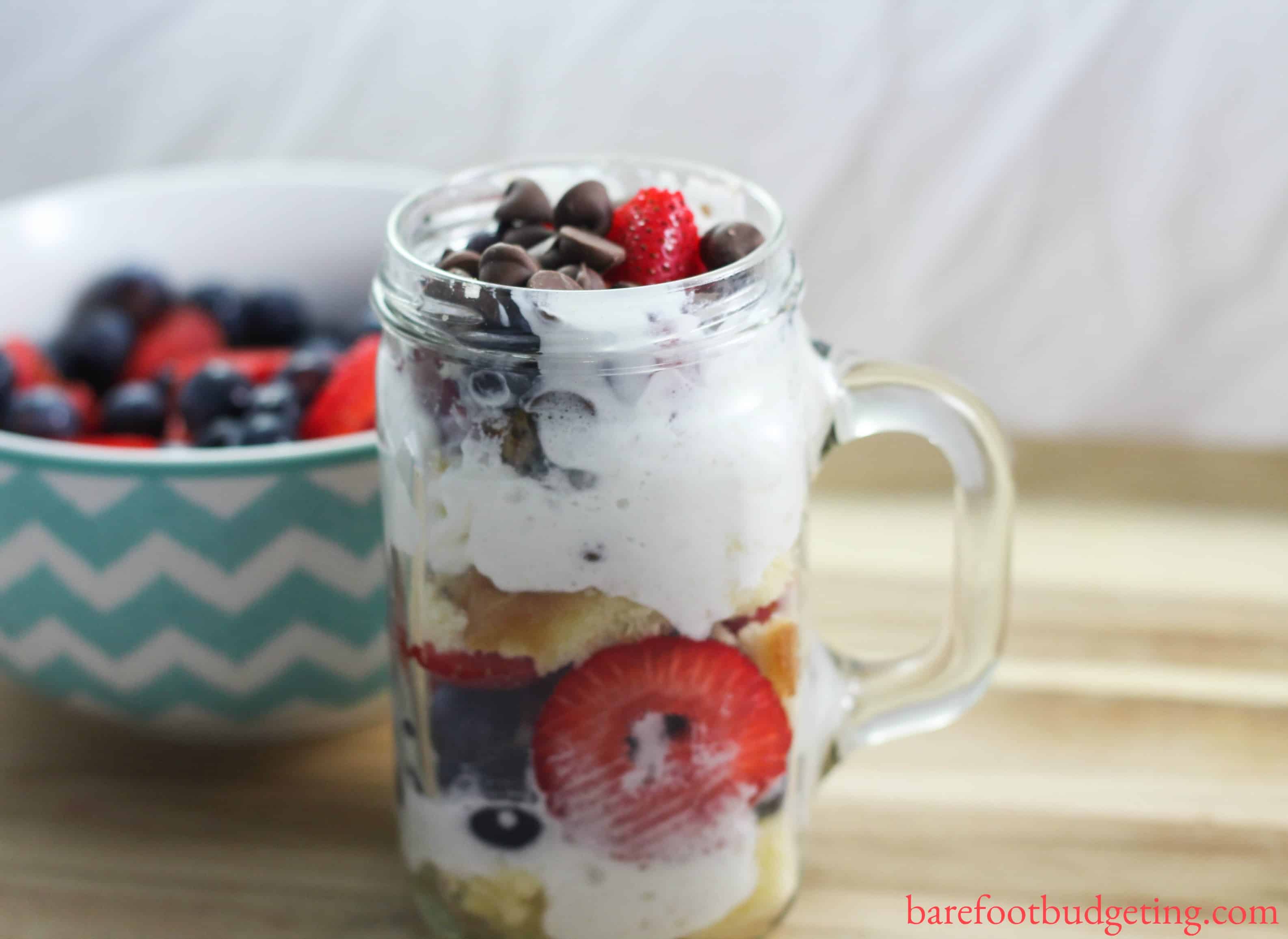 Mason Jar Berry Cake Trifle is the best dessert around! It's quick and easy to make and you can even make it a patriotic dessert for the holidays this summer!