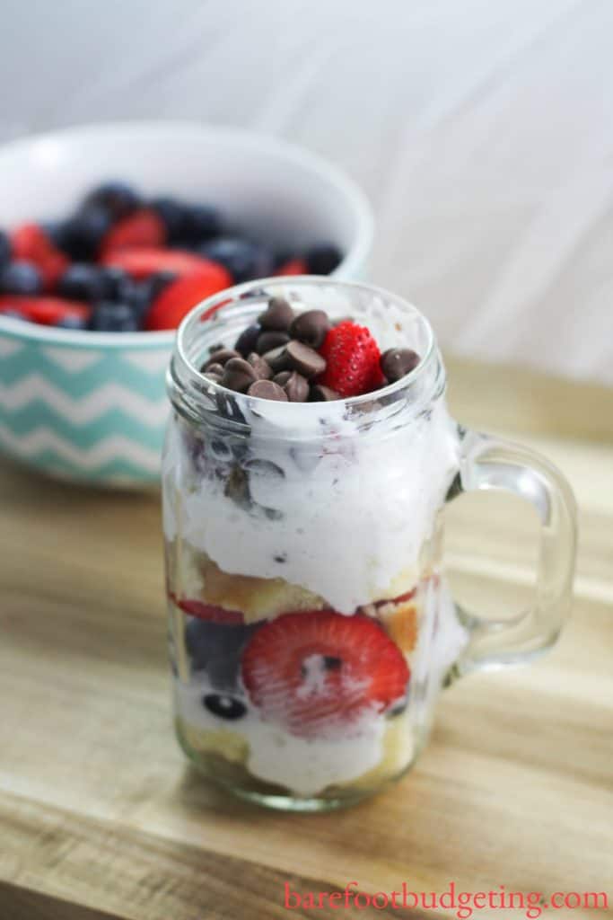 Mason Jar Berry Cake Trifle is the best dessert around! It's quick and easy to make and you can even make it a patriotic dessert for the holidays this summer!