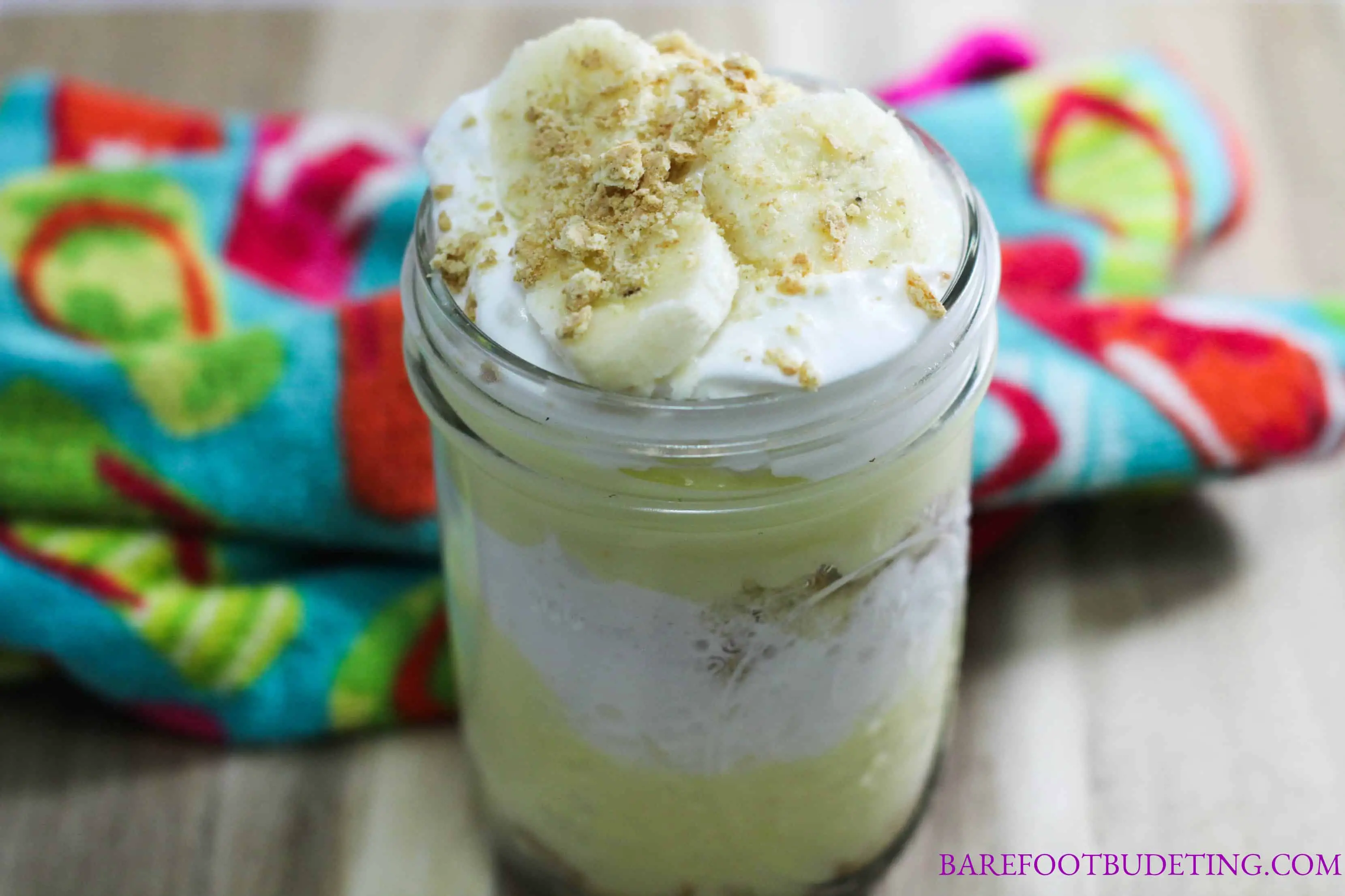 This Mason Jar Banana Cream Trifle recipe is sure to be a favorite dessert recipe for years to come!