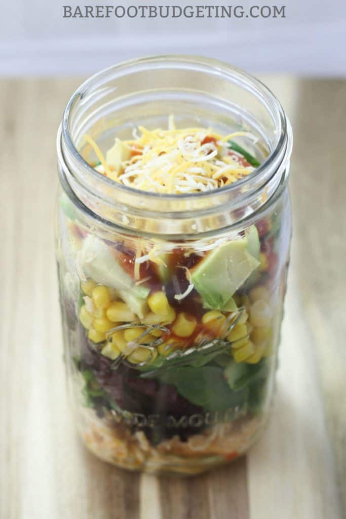 This Mason Jar Chicken Taco Salad recipe is perfect for those summer lunch ideas - it's healthy, stores well, and works perfect for meal planning with leftovers!