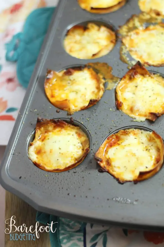 This easy baked lasagna cups recipe is sure to be a hit for the entire family! Serve it up as an appetizer or eat a few for an easy dinner!
