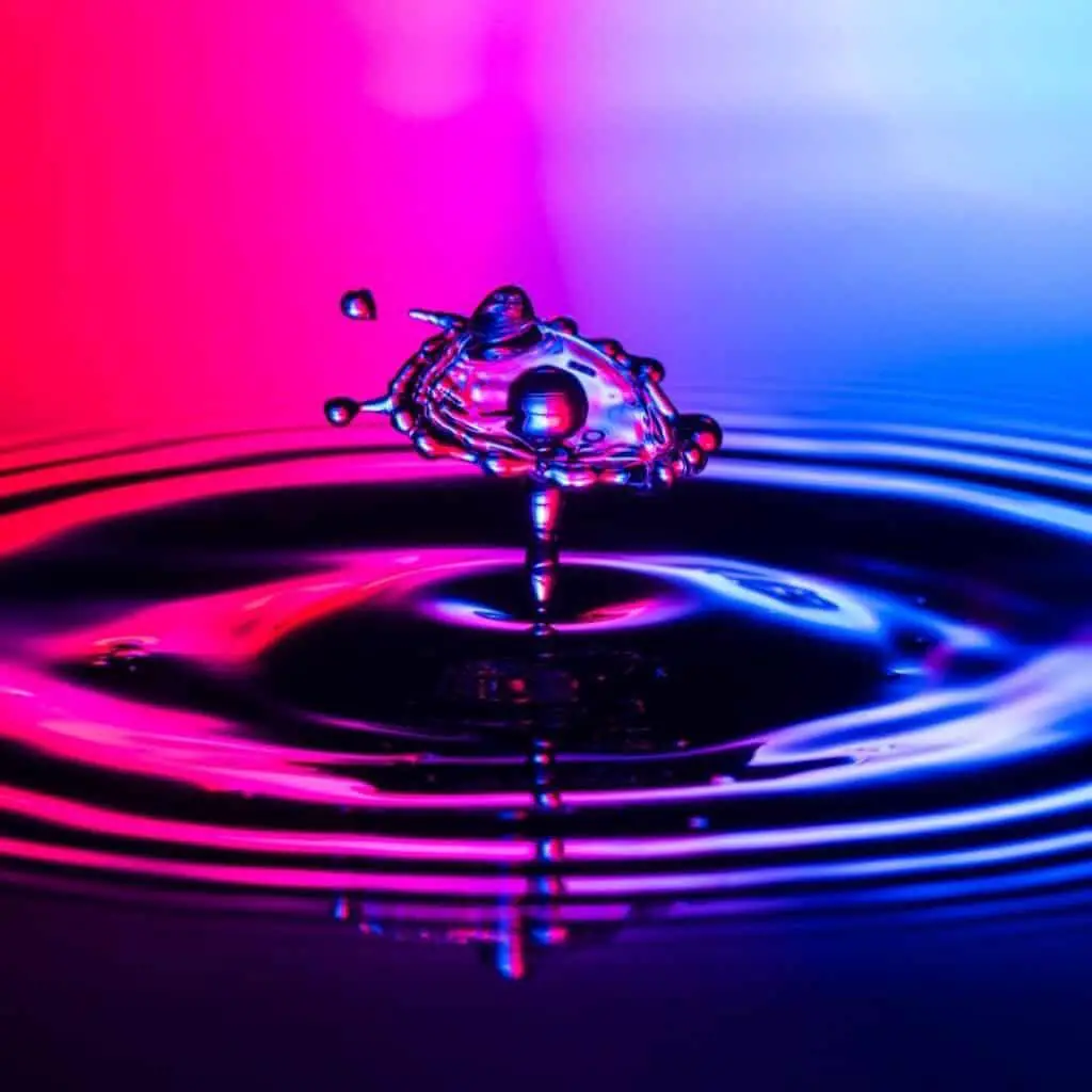 image; colorful drop of water splashing alone representing clarity